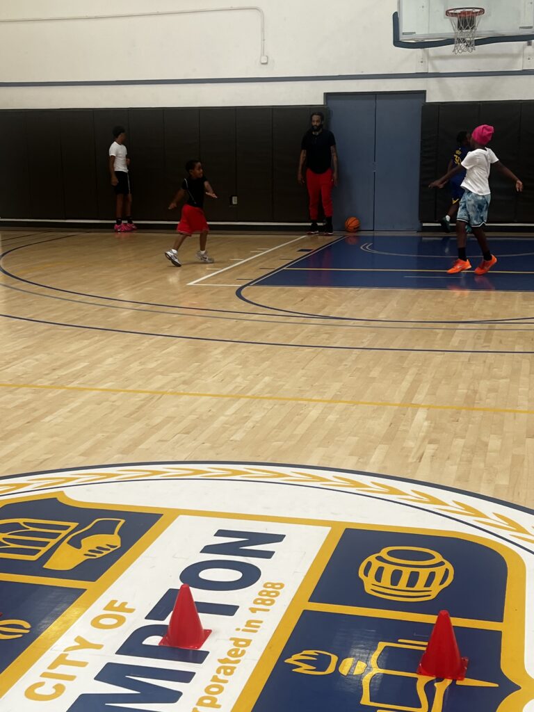 Basketball court with players