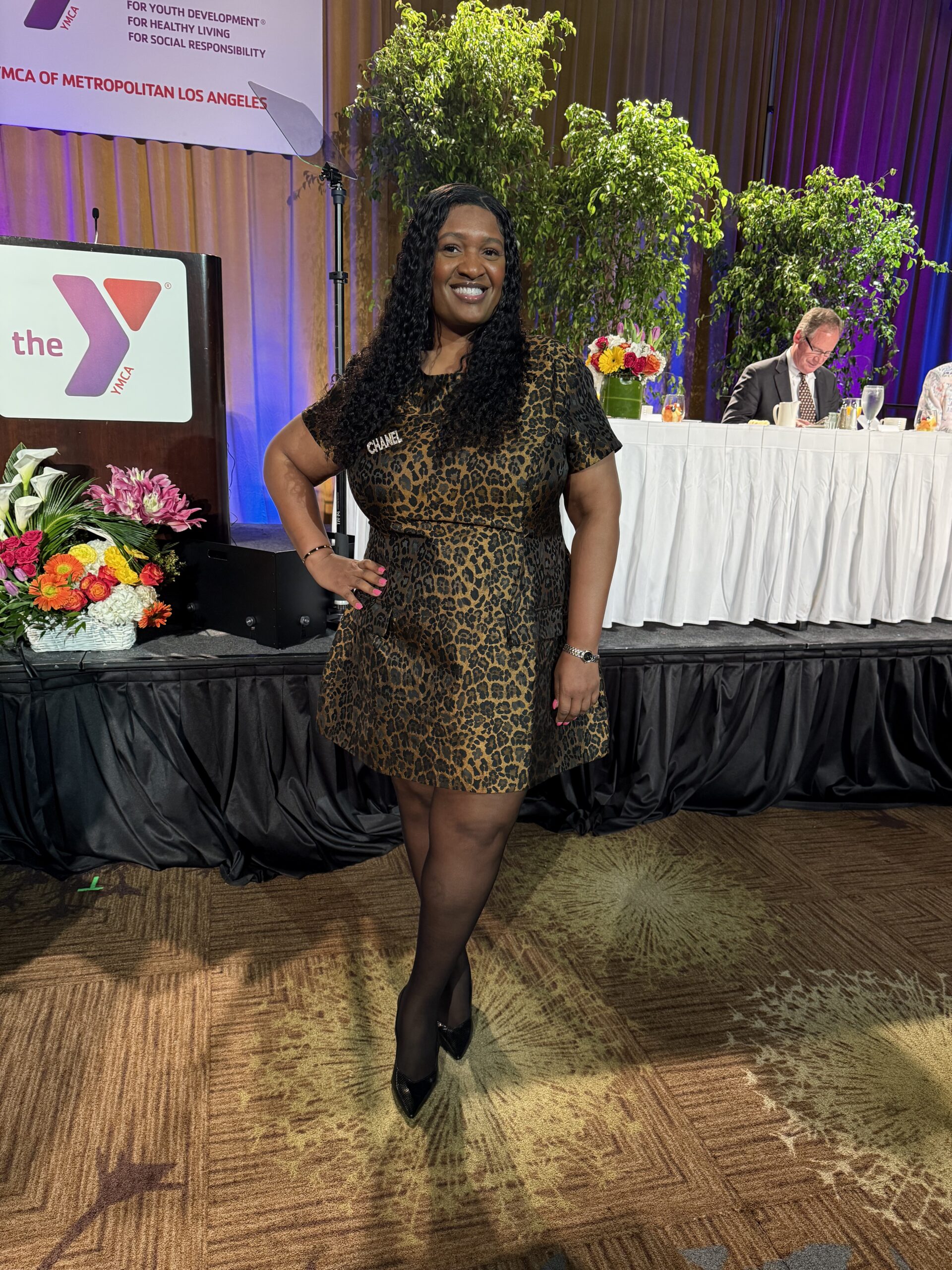 Woman poses at event